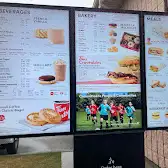 Tim Hortons storefront and interior at 6001 29th Ave, Beaumont, AB