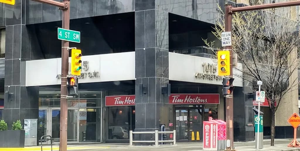 Tim Hortons storefront and interior at 1015 4th St Sw, Calgary, AB