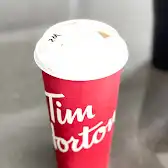 Tim Hortons storefront and interior at 1015 4th St Sw, Calgary, AB