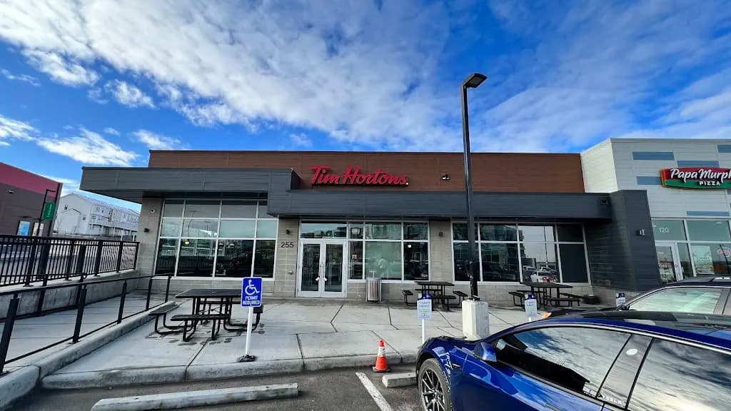 Tim Hortons storefront and interior at 102-255 Sage Vally Common Nw, Calgary, AB