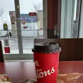Tim Hortons storefront and interior at 10810 50th St Se, Calgary, AB