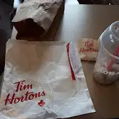 Tim Hortons storefront and interior at 11472 Braeside Dr Sw, Calgary, AB