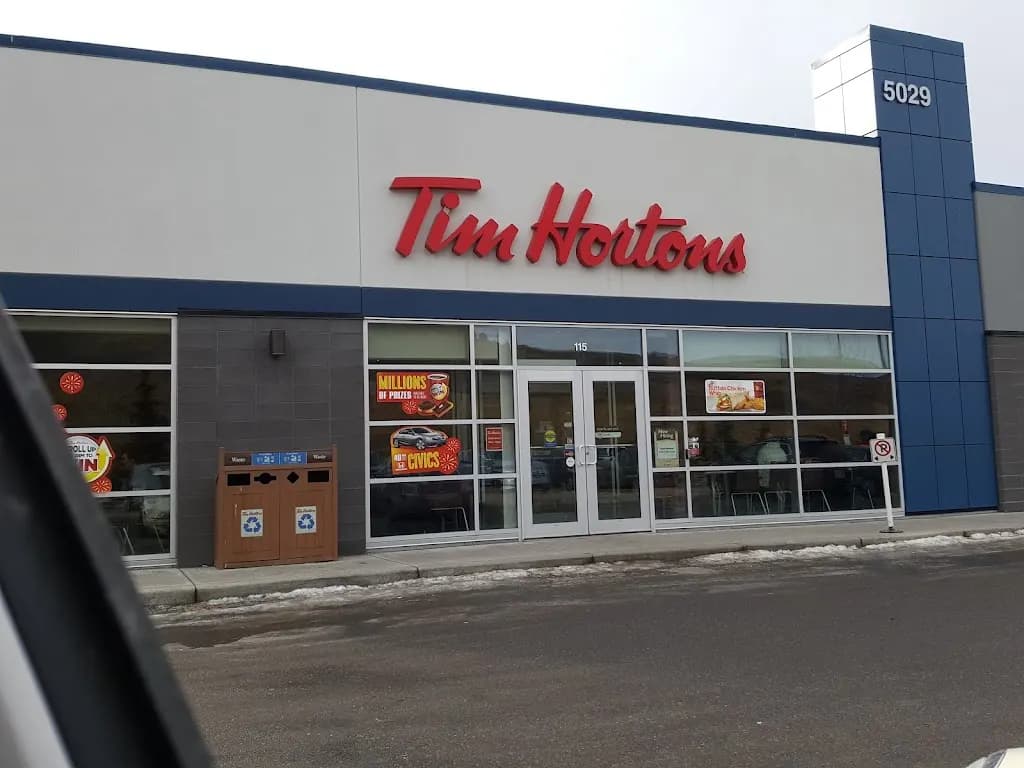 Tim Hortons storefront and interior at 115-5029 Nosehill Dr Nw, Calgary, AB