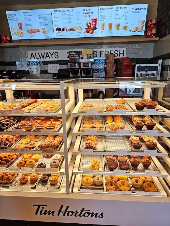 Tim Hortons storefront and interior at 1155 - Cornerstone Blvd Ne, Calgary, AB