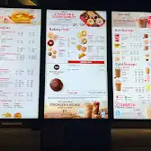 Tim Hortons storefront and interior at 1185 49th Ave Ne, Calgary, AB