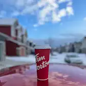 Tim Hortons storefront and interior at 12580 Symons Valley Rd Nw, Calgary, AB