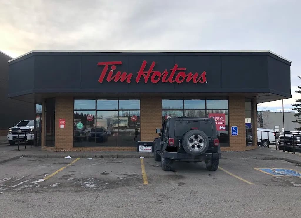 Tim Hortons storefront and interior at 1341 32nd Ave Ne, Calgary, AB