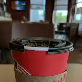Tim Hortons storefront and interior at 1341 32nd Ave Ne, Calgary, AB