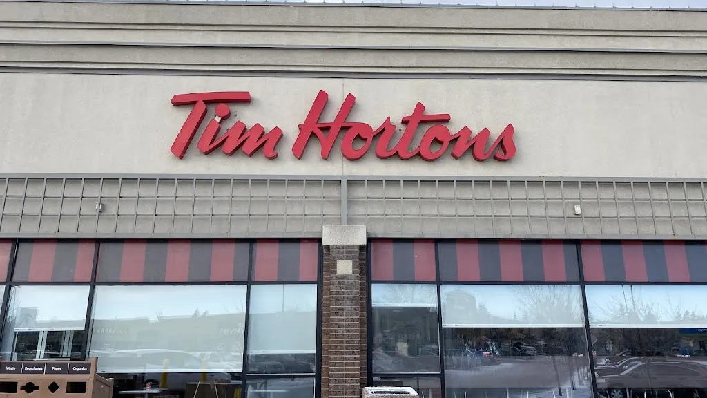 Tim Hortons storefront and interior at 1440 52nd St Ne, Calgary, AB