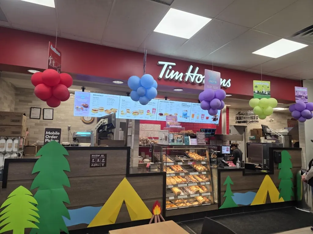 Tim Hortons storefront and interior at 45 Everridge Dr Sw, Calgary, AB