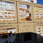 Tim Hortons storefront and interior at 200-10233 Elbow Dr Sw, Calgary, AB