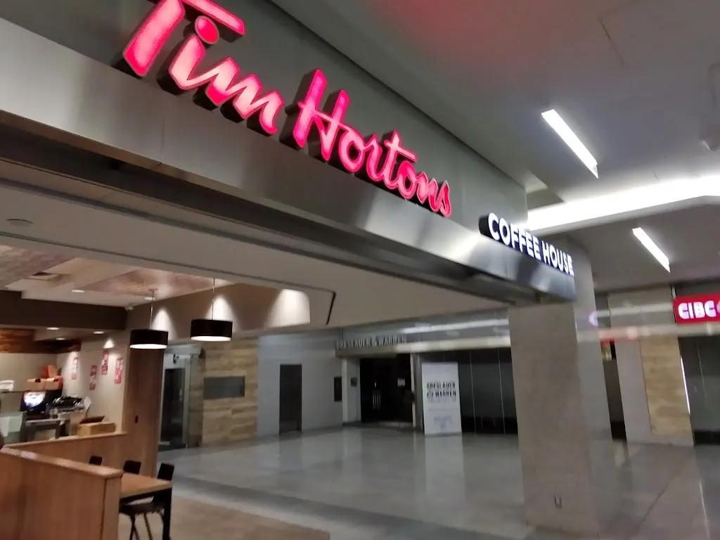 Tim Hortons storefront and interior at 222 205 5th Ave Sw, Calgary, AB