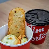 Tim Hortons storefront and interior at 225 7th Ave Sw, Calgary, AB