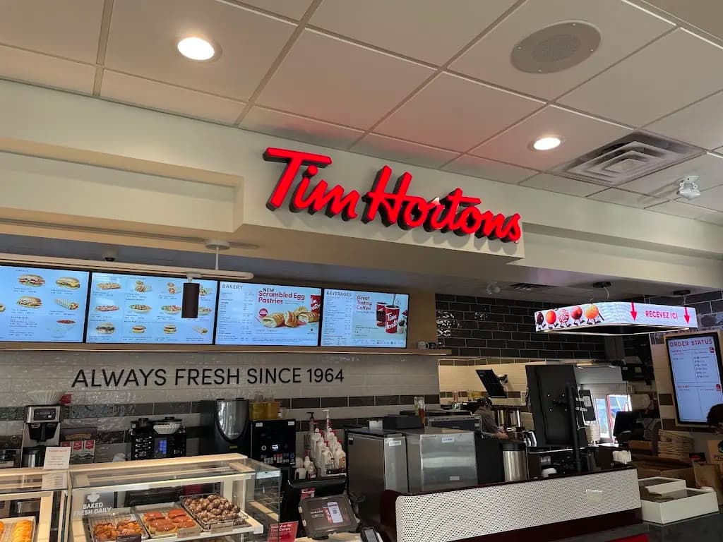 Tim Hortons storefront and interior at 303 Shawville Blvd Se, Calgary, AB