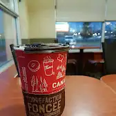 Tim Hortons storefront and interior at 303 Shawville Blvd Se, Calgary, AB