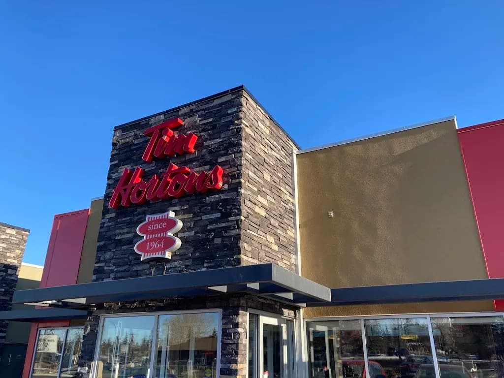 Tim Hortons storefront and interior at 347 Southland Dr, Calgary, AB