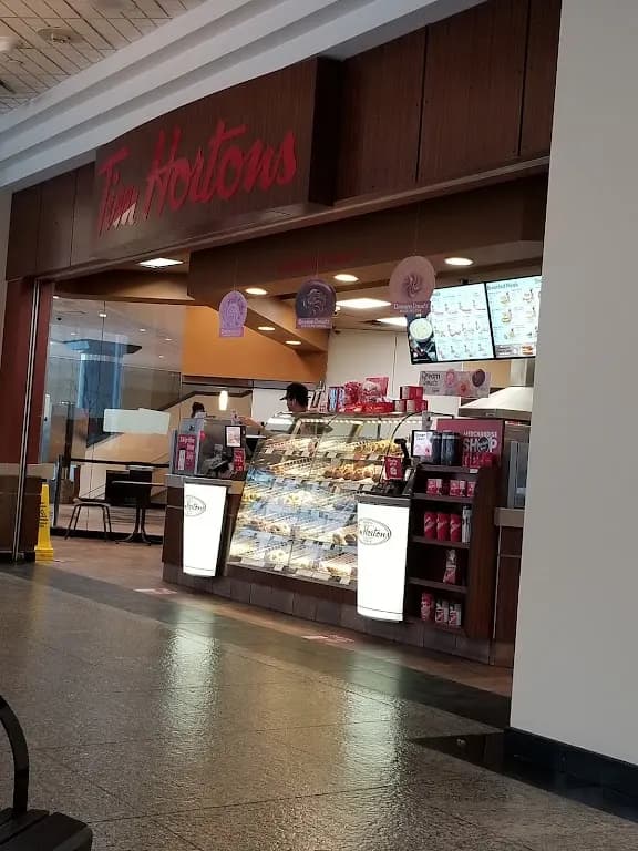 Tim Hortons storefront and interior at 401 9th Ave Sw, Calgary, AB