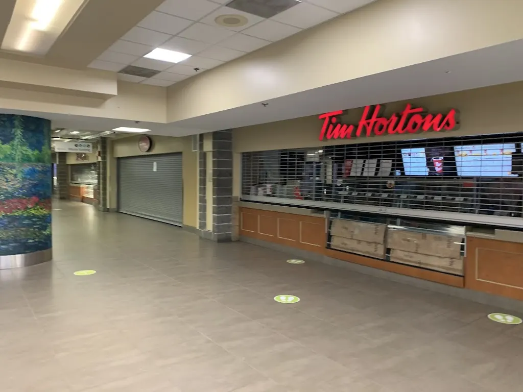 Tim Hortons storefront and interior at 402 Collegiate Blvd Nw, Calgary, AB