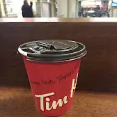 Tim Hortons storefront and interior at 402 Collegiate Blvd Nw, Calgary, AB