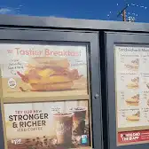 Tim Hortons storefront and interior at 444 58th Ave Se, Calgary, AB