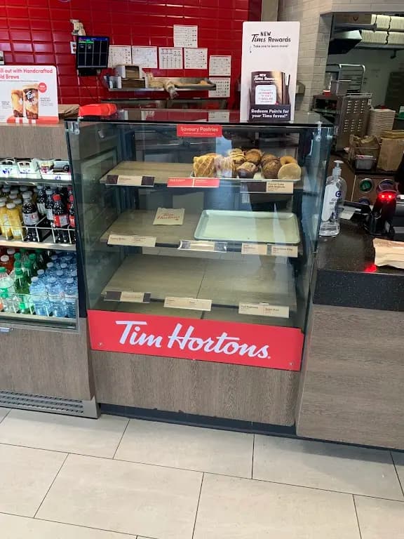 Tim Hortons storefront and interior at 924 16th Ave Nw, Calgary, AB