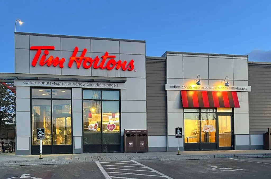 Tim Hortons storefront and interior at 979 64th Ave Ne, Calgary, AB