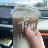 Tim Hortons storefront and interior at 979 64th Ave Ne, Calgary, AB