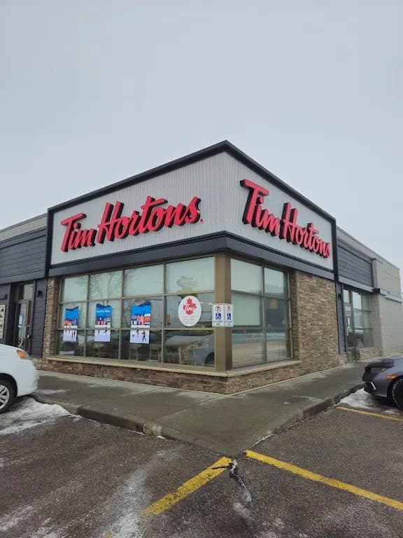 Tim Hortons storefront and interior at 2021 Pegasus Rd Ne, Calgary, AB