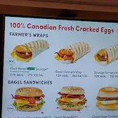 Tim Hortons storefront and interior at 2021 Pegasus Rd Ne, Calgary, AB