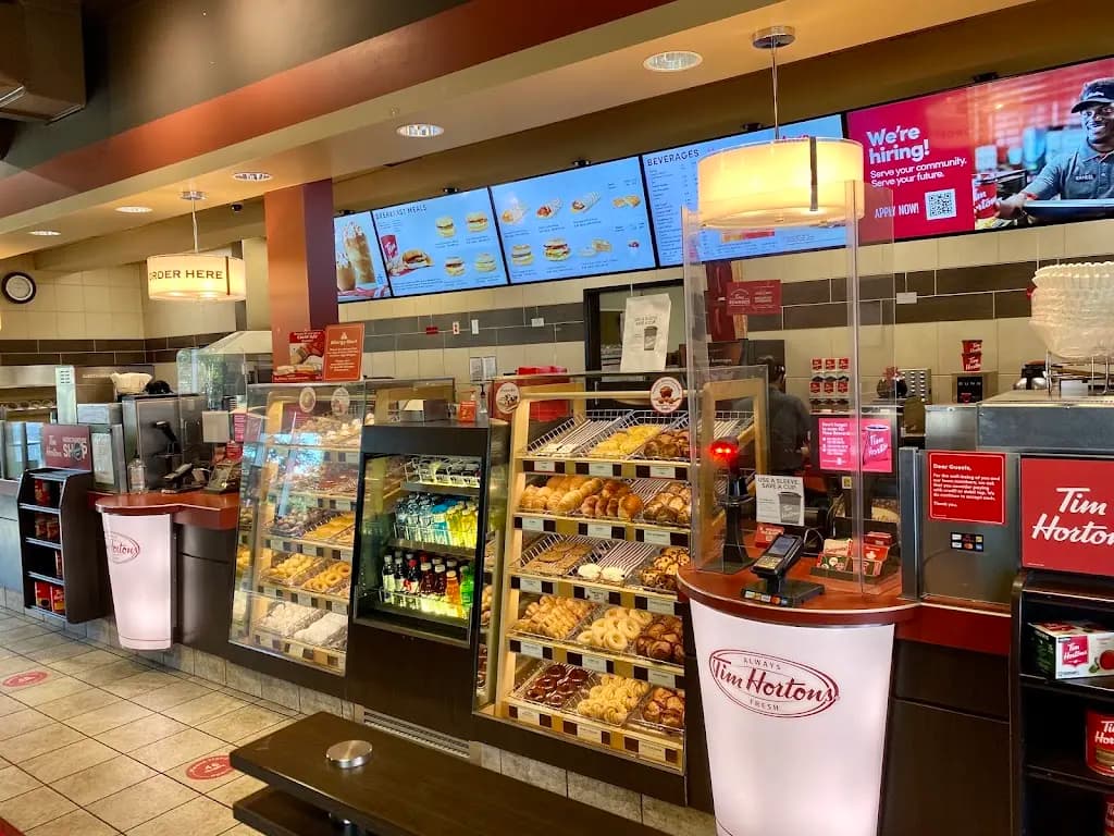 Tim Hortons storefront and interior at 2335 162nd Ave Sw, Calgary, AB