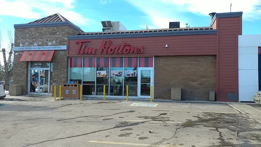 Tim Hortons storefront and interior at 2520 52 St Ne, Calgary, AB