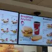Tim Hortons storefront and interior at 2525 Woodview Dr Sw, Calgary, AB