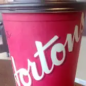 Tim Hortons storefront and interior at 2525 Woodview Dr Sw, Calgary, AB