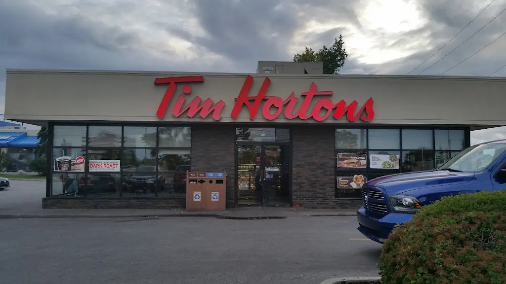 Tim Hortons storefront and interior at 2681 Sunridge Way Ne, Calgary, AB