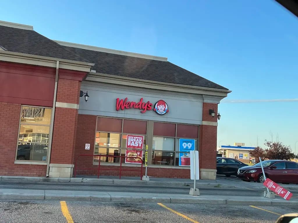 Tim Hortons storefront and interior at 3660 Westwinds Dr Ne, Calgary, AB
