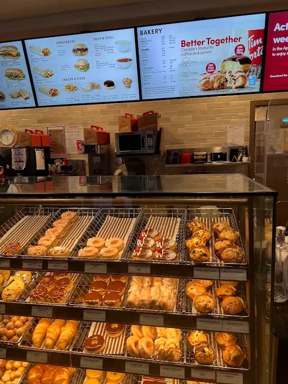 Tim Hortons storefront and interior at 3800 Memorial Dr Ne, Calgary, AB
