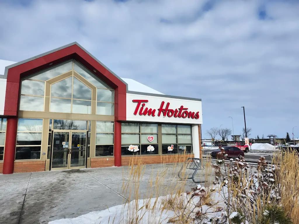 Tim Hortons storefront and interior at 4307 130th Ave Se, Calgary, AB