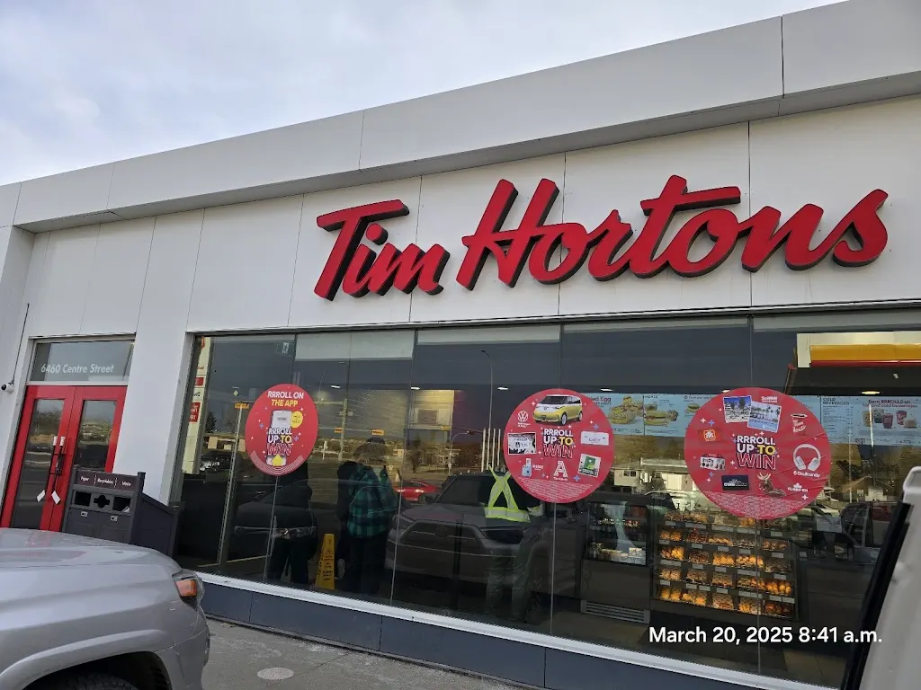 Tim Hortons storefront and interior at 6460 Centre St Ne, Calgary, AB