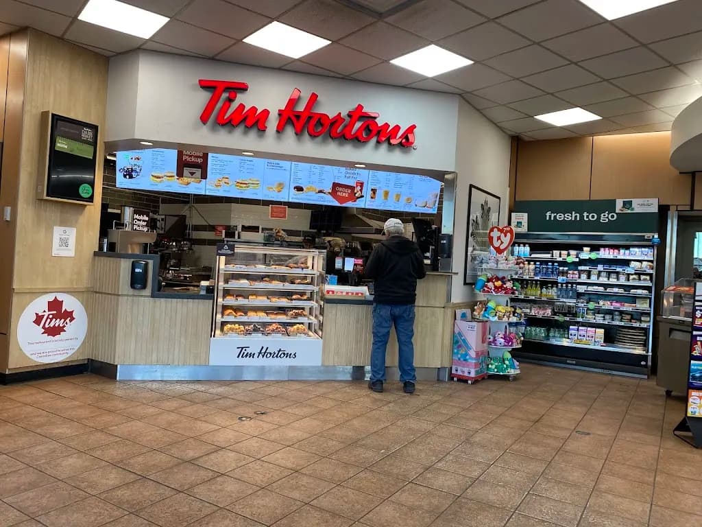 Tim Hortons storefront and interior at 6510 Country Hills Nw, Calgary, AB
