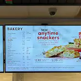 Tim Hortons storefront and interior at 6825 Macleod Trail S, Calgary, AB