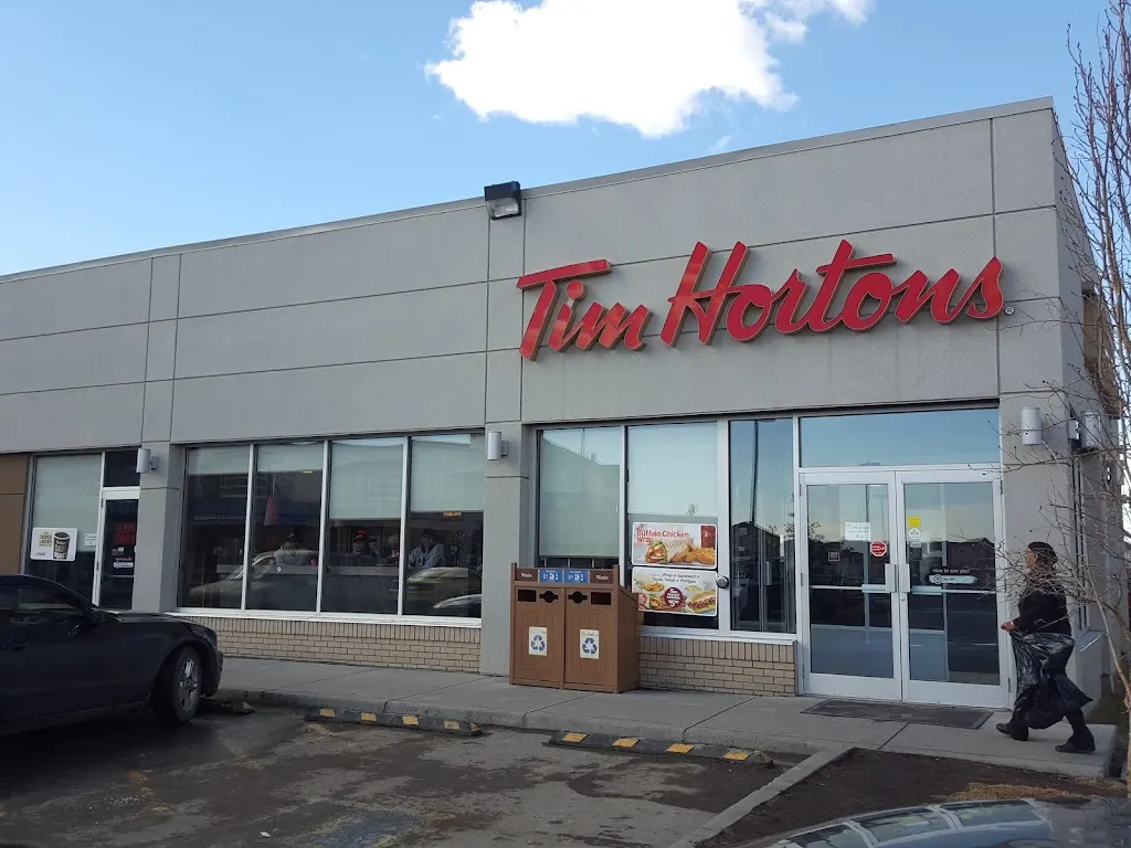 Tim Hortons storefront and interior at 7170 80th Avenue Ne, Calgary, AB