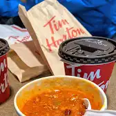 Tim Hortons storefront and interior at Unit 7, 28 Mckenzie Towne Avenue, Calgary, AB