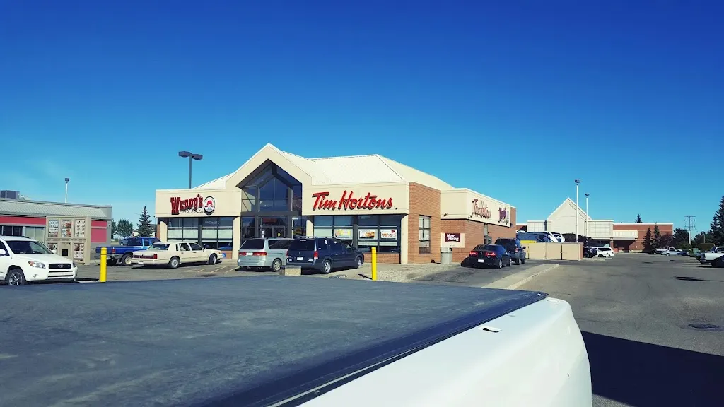 Tim Hortons storefront and interior at 6602 48th Ave, Camrose, AB