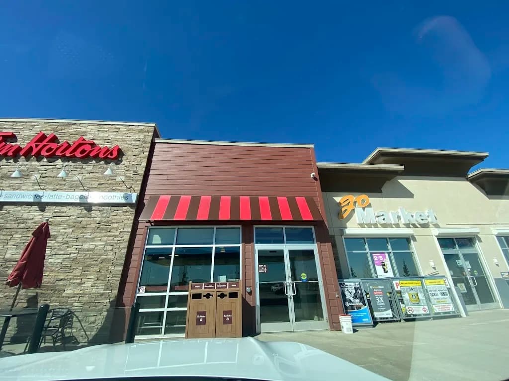 Tim Hortons storefront and interior at 2409 16 St, Didsbury, AB