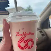 Tim Hortons storefront and interior at 1101 Highway N, Drumheller, AB