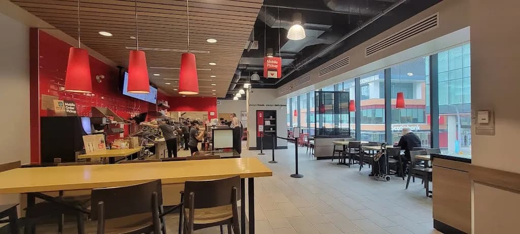 Tim Hortons storefront and interior at Unit #240 - 10111 104 Avenue, Edmonton, AB
