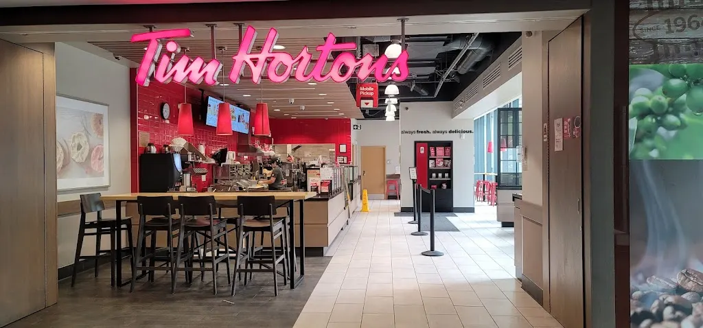 Tim Hortons storefront and interior at 10220 104 Ave Nw, Edmonton, AB