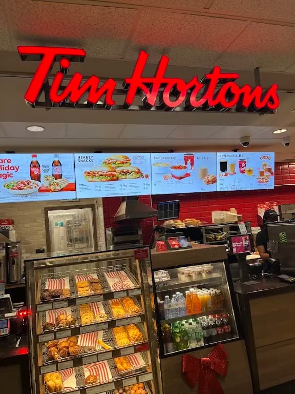 Tim Hortons storefront and interior at 10240 Kingsway Royal Alexandra Ho, Edmonton, AB