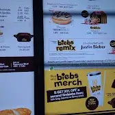 Tim Hortons storefront and interior at 16039 97th St, Edmonton, AB