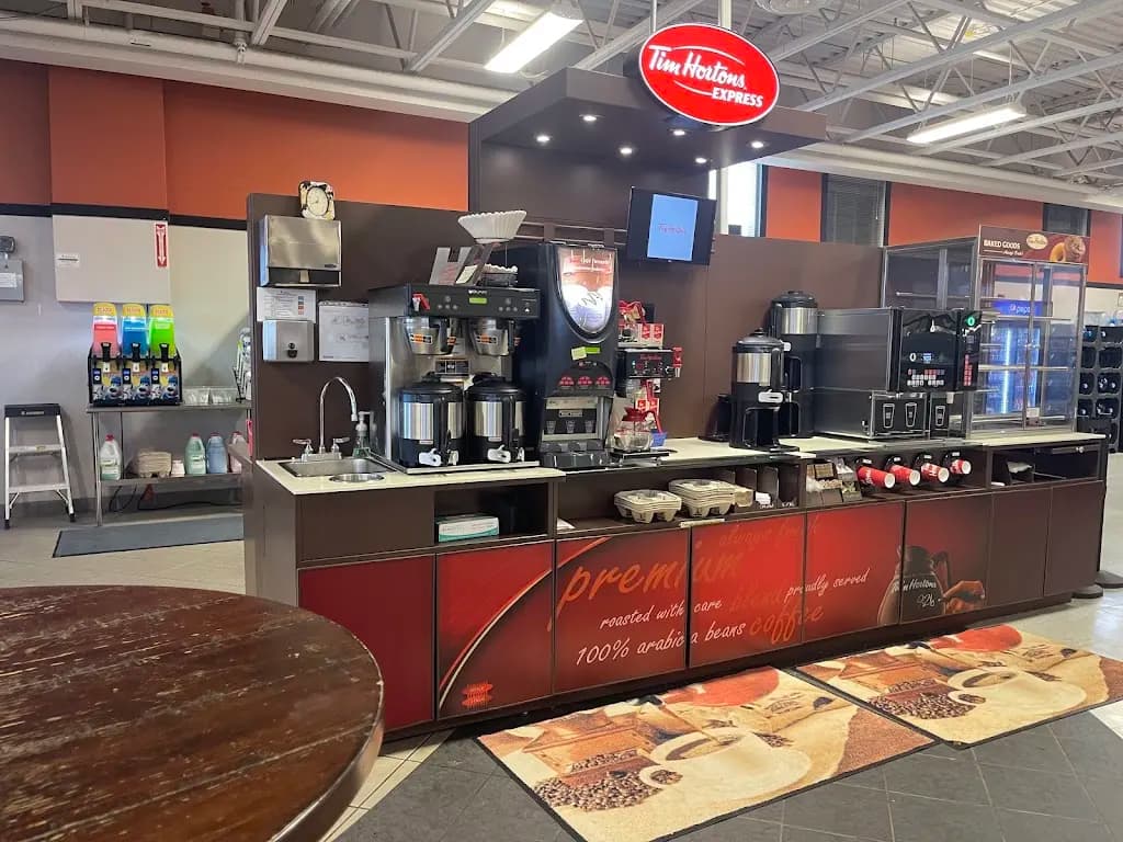 Tim Hortons storefront and interior at Suffield Supermart, Ralston, AB